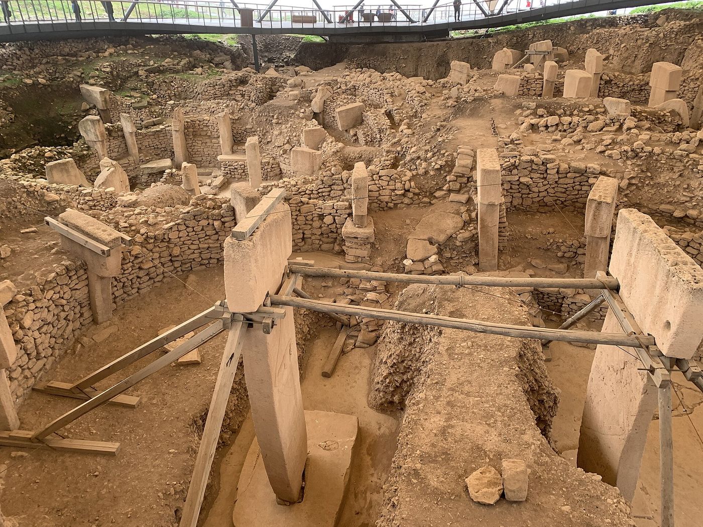 T-shaped limestone pillars standing inside a circular enclosure at Göbeklitepe
